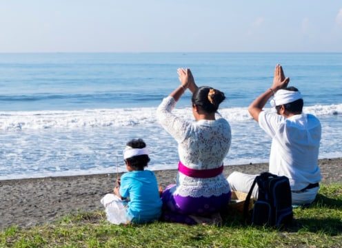Balinese praying to Baruna the god of the sea before Nyepi Day